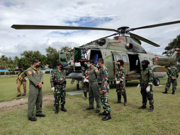 Aksi Heroik Prajurit TNI Evakuasi Dua Jenazah Teroris MIT di Poso 1 Aksi Heroik Prajurit TNI Evakuasi Dua Jenazah Teroris MIT di Poso 2
