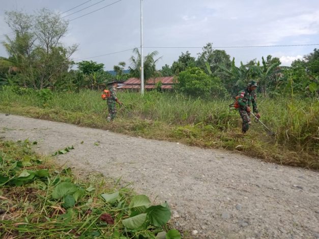 Satgas TNI Bersama Aparat Desa dan Masyarakat Laksanakan Kerja Bakti 2